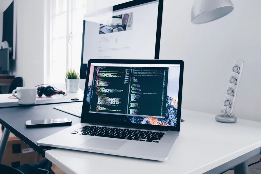 Engineer focused at laptop — product engineering support