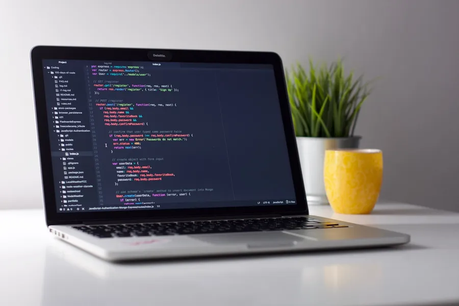 Developer working at monitor — internal systems and dashboards